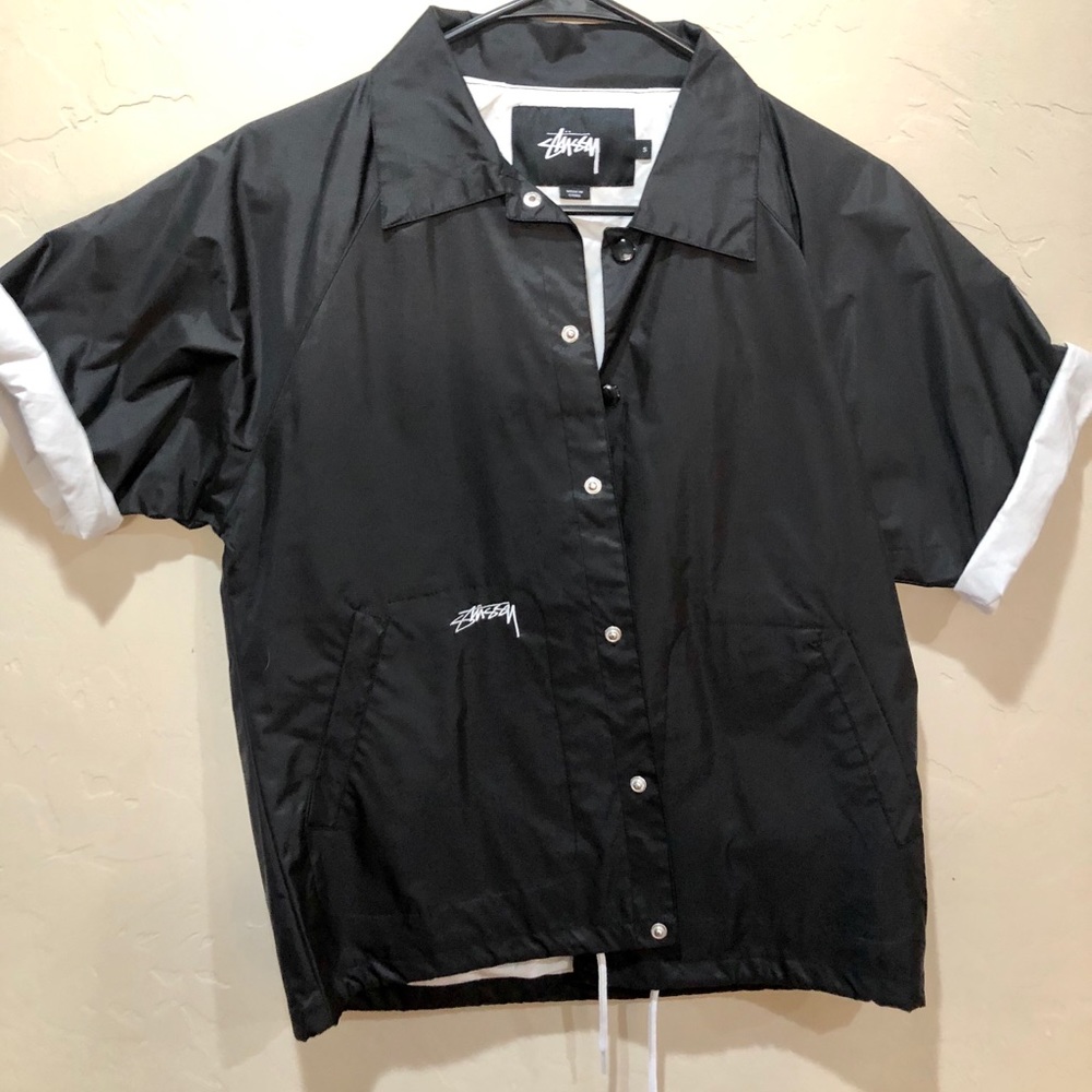 Black Stüssy button front overcoat